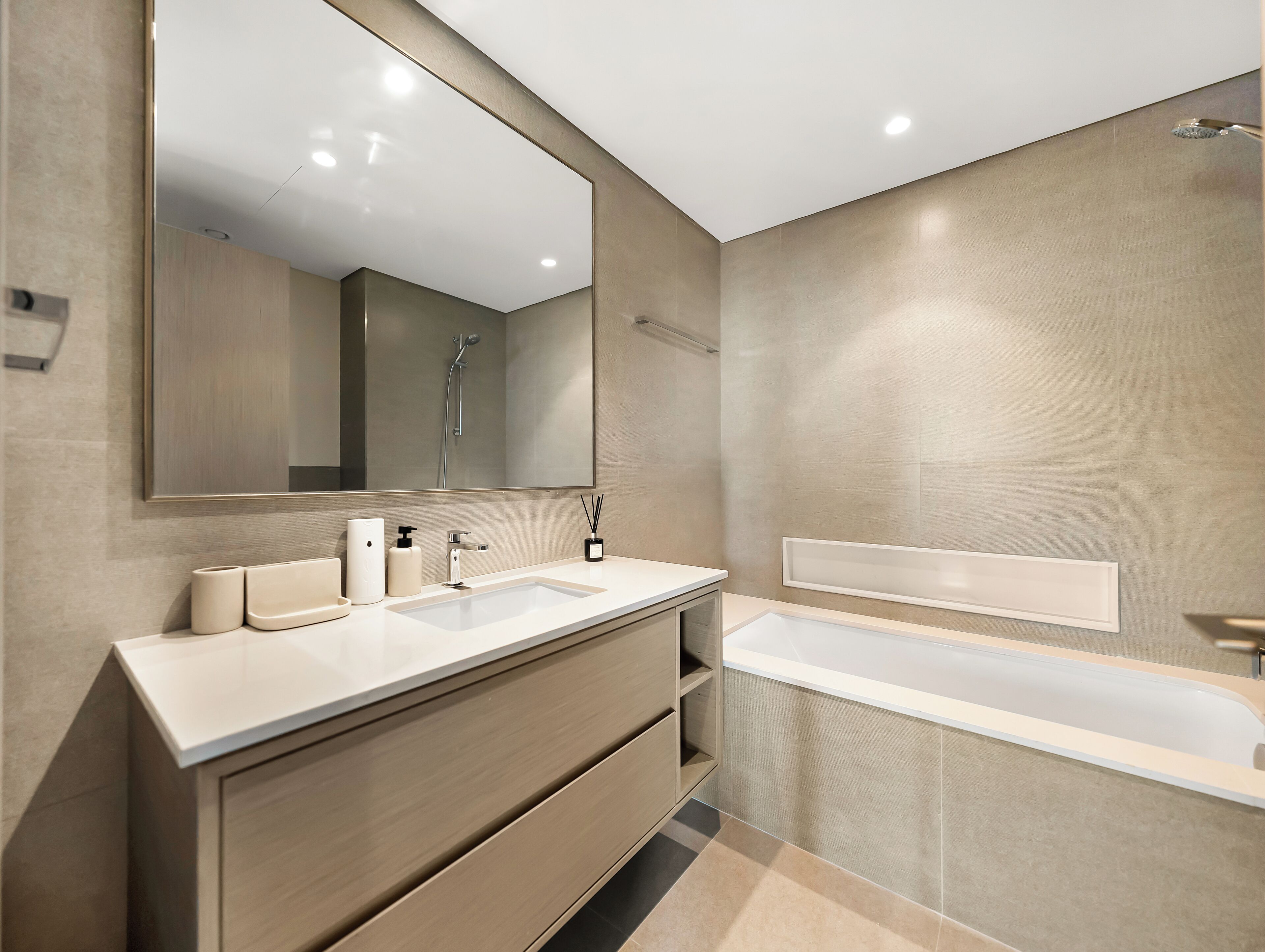 Separate bathtub and shower, hair dryer, towels