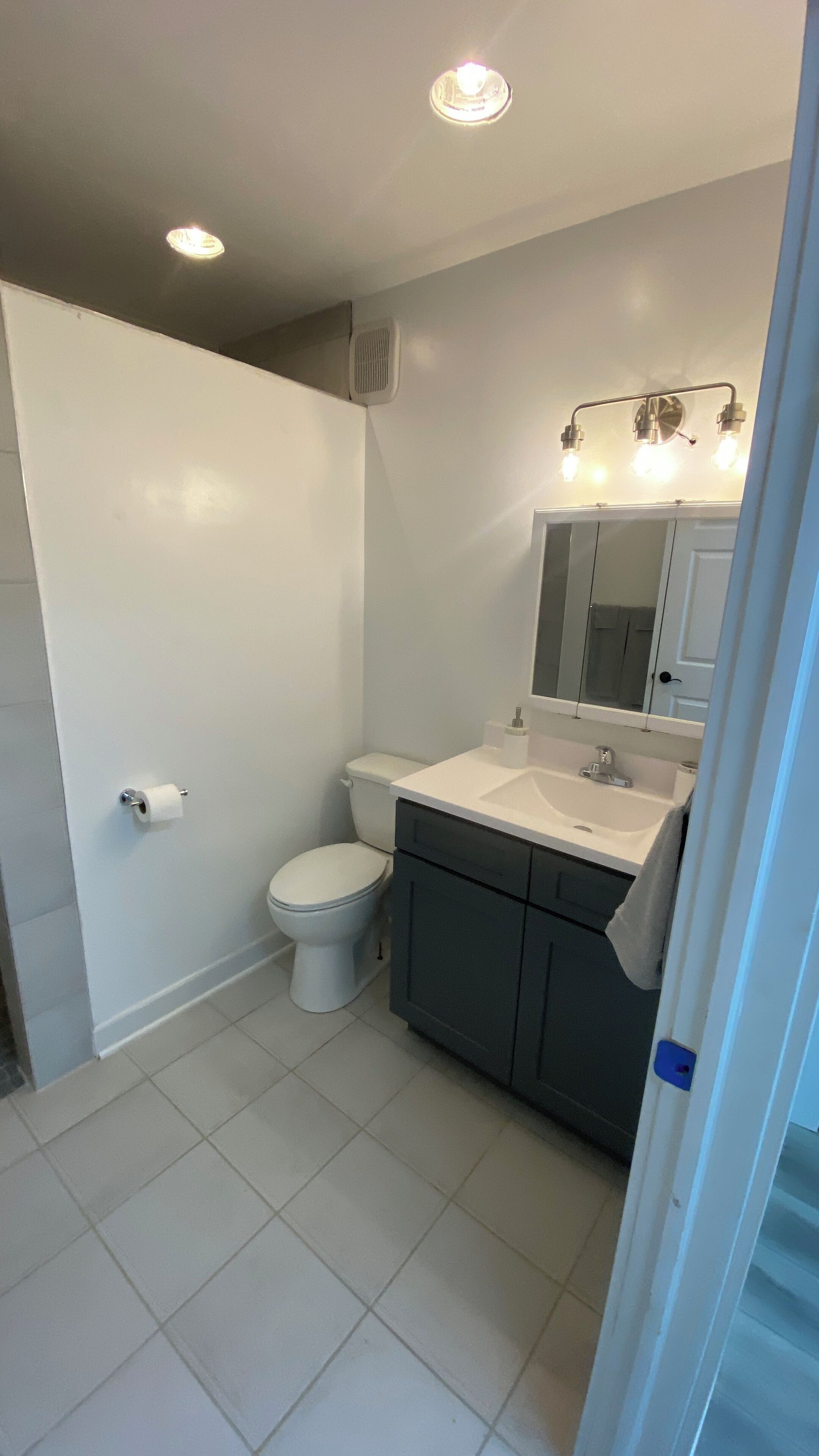 Shower, towels, soap, toilet paper