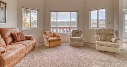 Spacious home with private dock, game room, lake views from the deck, and more!