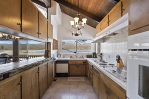 Fridge, microwave, oven, stovetop - Lakefront home with amazing mountain and lake views, game room, BBQ grill + more (Big Bear Lake)