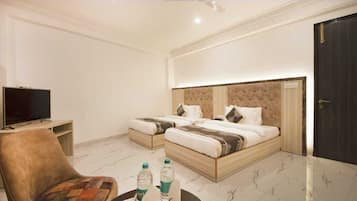 Premium bedding, memory-foam beds, desk, laptop workspace