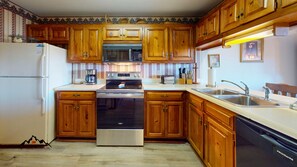 Refrigerador, microondas, horno y parrilla de estufa 