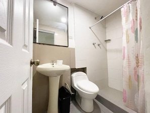 Shower, towels, soap, toilet paper