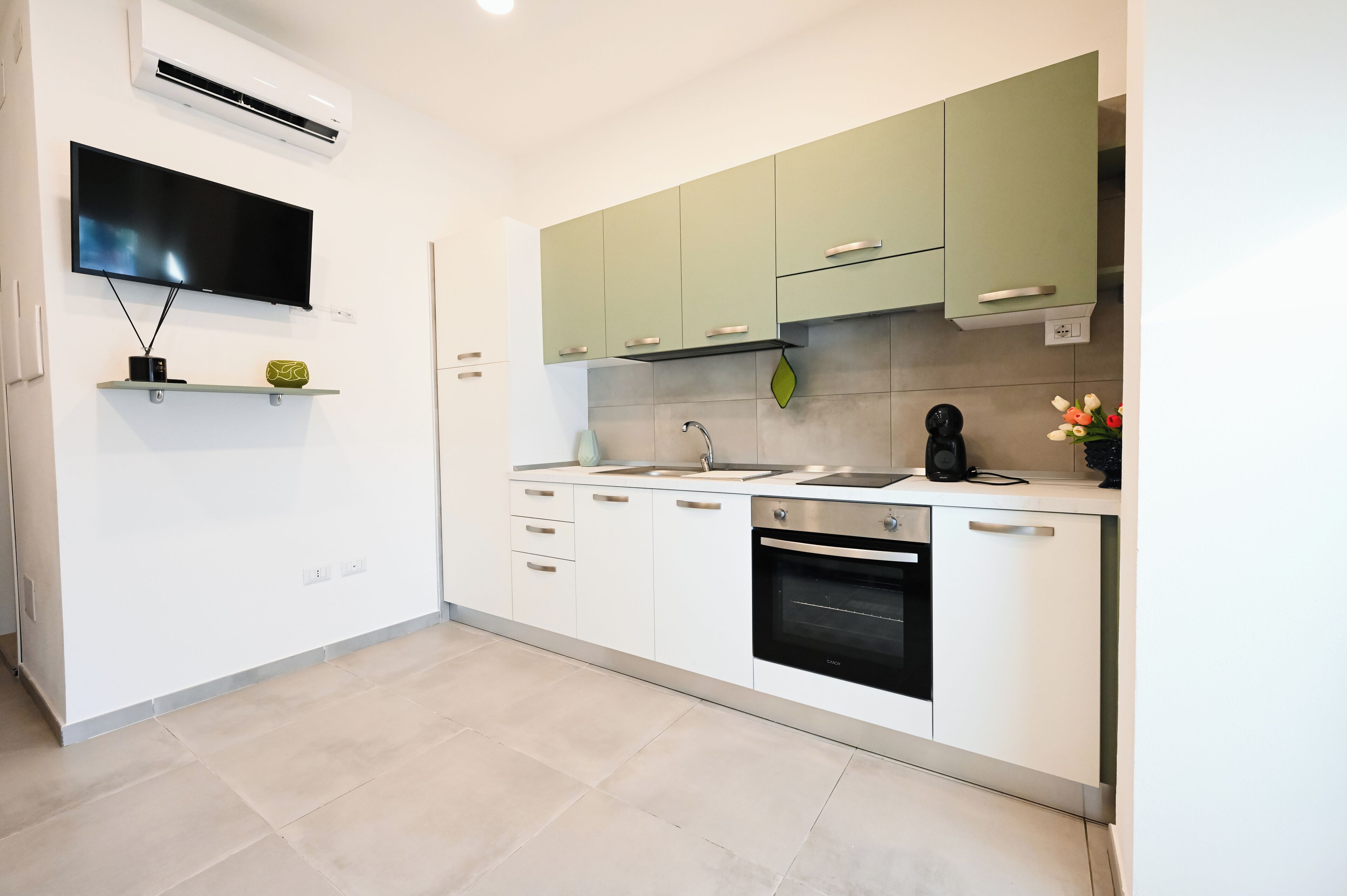 Comfort Apartment (Ottavia) | Private kitchen | Full-sized fridge, oven, stovetop, high chair