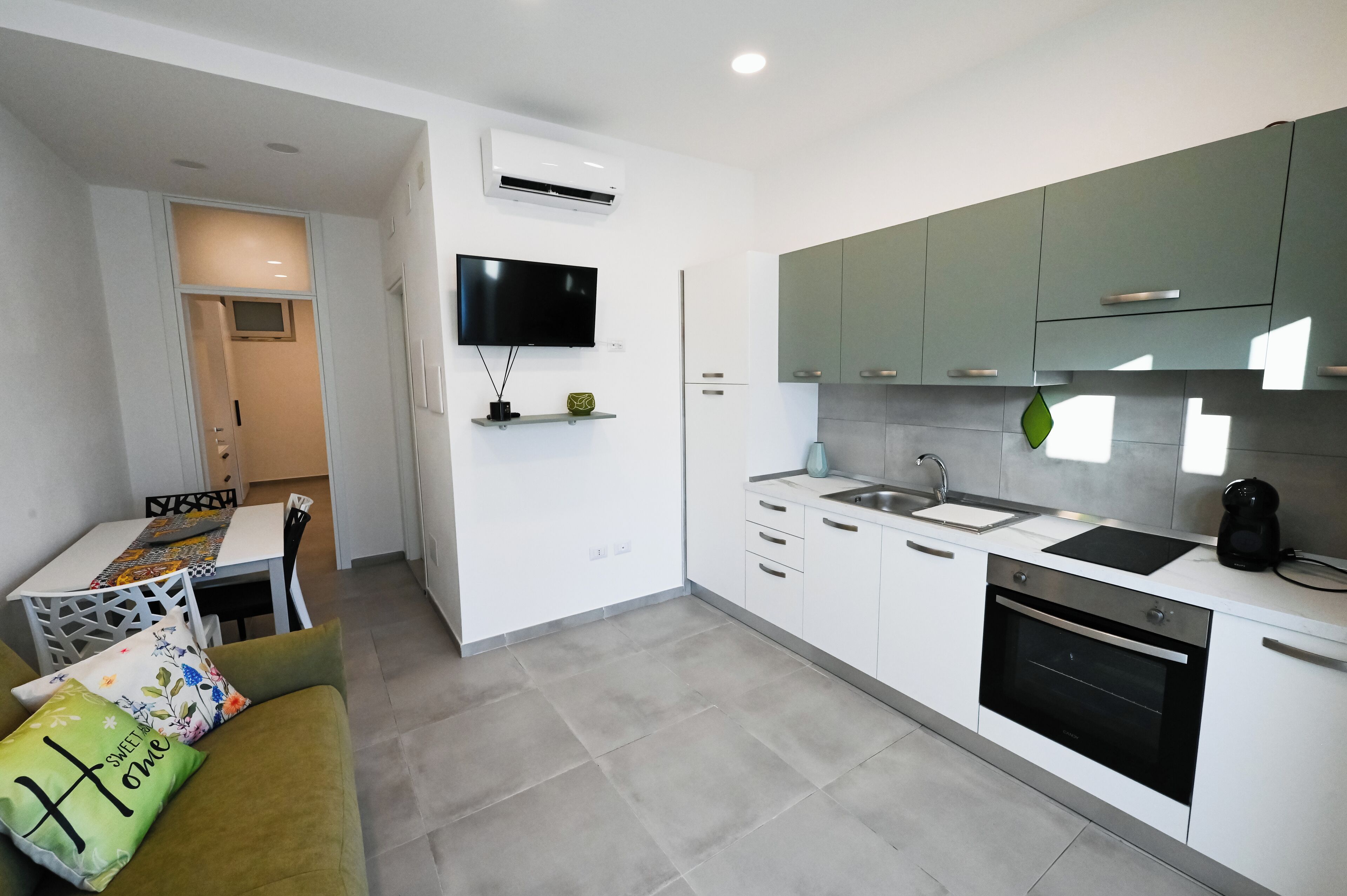 Comfort Apartment (Ottavia) | Private kitchen | Full-size fridge, oven, stovetop, highchair