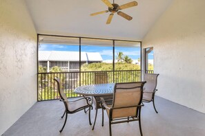Outdoor dining - Lofted Captiva Condo with Pool and Beach Access! (Captiva)