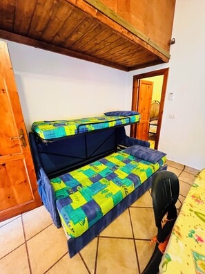 Apartment | Living area | 22-inch flat-screen TV with cable channels