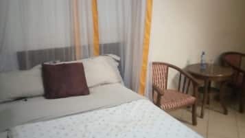 Habitación doble Deluxe, vista a la ciudad | Wifi gratis y ropa de cama