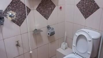 Standard Double Room, City View | Bathroom | Shower, slippers, towels, soap