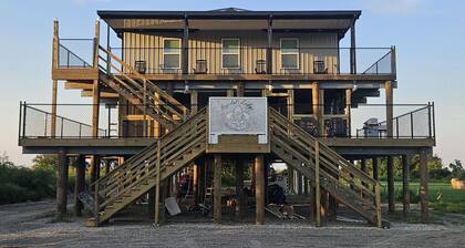 Reggio- Hopedale Lodge and Fishing Charters. South Louisiana sportsman`s paradise premier lodging and fishing adventure
