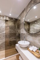 Shower, free toiletries, hair dryer, slippers