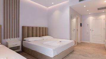 Standard Triple Room, Balcony | Hypo-allergenic bedding, minibar, desk, blackout drapes