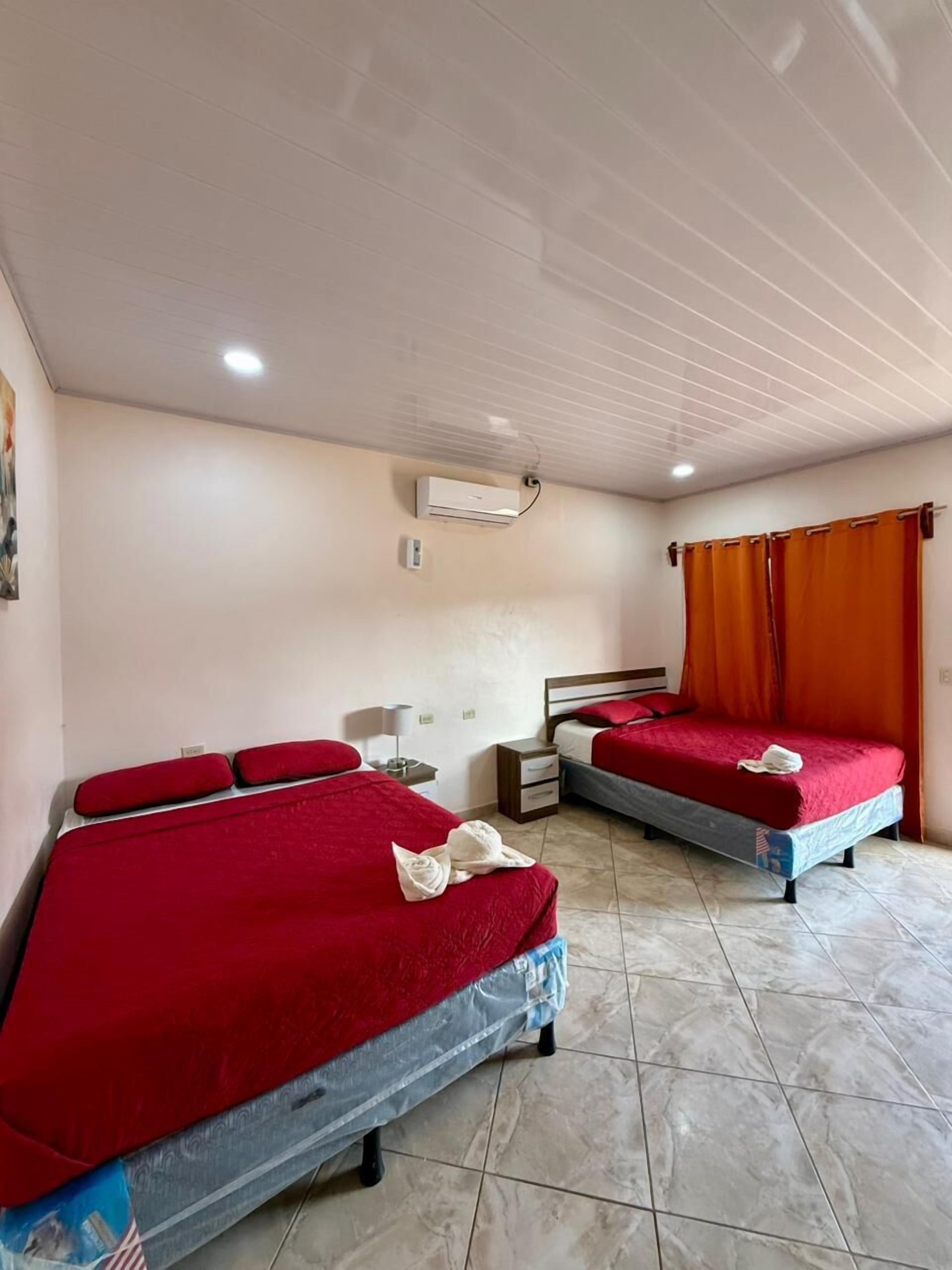 Deluxe Double Room, Multiple Beds | Premium bedding, minibar, individually decorated, individually furnished
