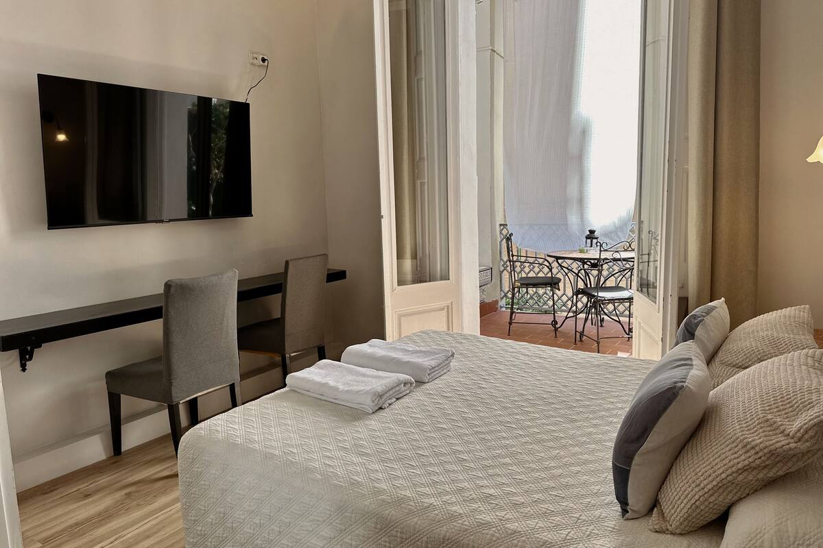 Deluxe Double Room, Patio, City View | In-room safe, free WiFi