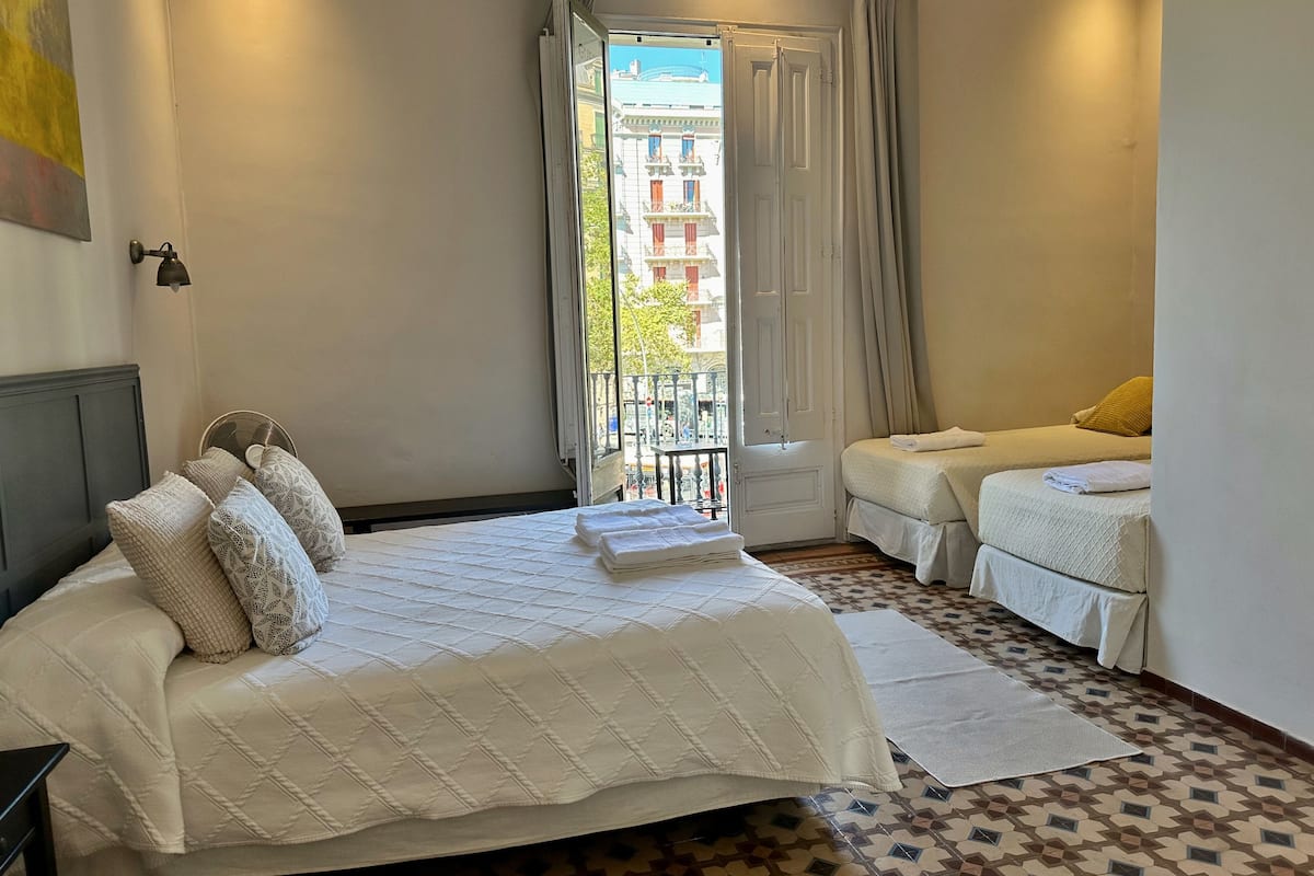 Family Quadruple Room, Balcony, City View | In-room safe, soundproofing, WiFi (free)