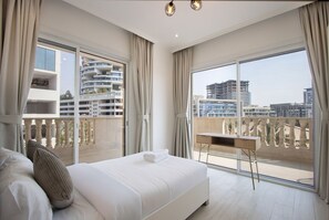 2 bedrooms, iron/ironing board, free WiFi, bed sheets - Bright 2BR in JVC | Pool, Gym & Modern Comfort (Dubai)