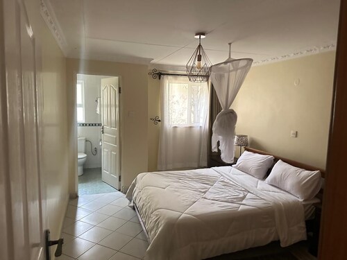 Luxury 4-bedroom villa with fitness room and AC in welcoming Athi River GP