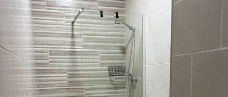 Shower, towels, soap, toilet paper