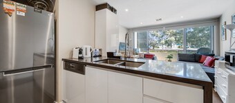 Tranquil Apartment in Green, Well Connected Suburb