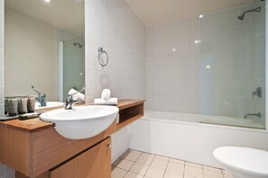 Apartment | Bathroom | Bathtub, hair dryer, towels, soap - Bright 2-bed Apartment Near Wentworth Point Sights (Sydney)