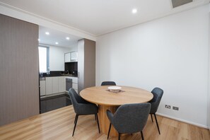 Apartment | Dining - Modern 1-bed Unit With Pool Views and Balcony (Canberra)