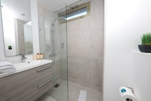 Hair dryer, towels, soap, shampoo