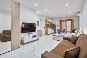 Living area - Il-Girna- Modern Seaside Accommodation-Studio with Sea View (Wied il-Għajn)