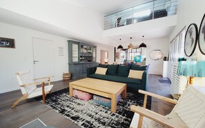 Smart TV, fireplace, books, printers