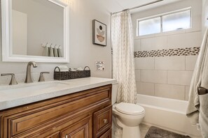 Hair dryer, towels, soap, toilet paper