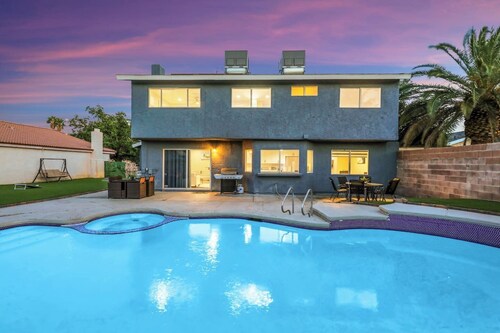 TWAIN AVE · Modern Oasis: Heated Pool & Game Room