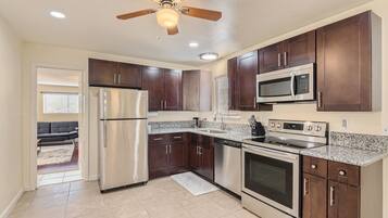 Coffee/tea maker, fridge, microwave, oven
