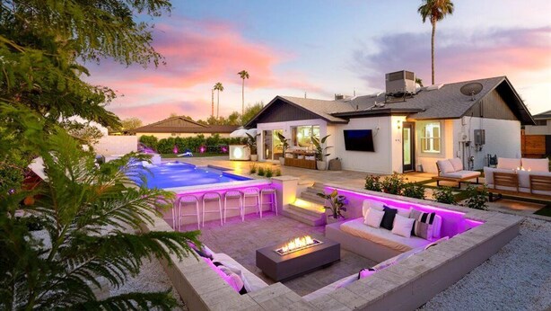 A modern house with a pool, outdoor seating, and a well-maintained garden. - Old Town's  Luxury Oasis - 16+ Guests, Designed for entertainment & relaxation. (Scottsdale)