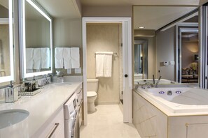 Jetted tub, hair dryer, towels, soap