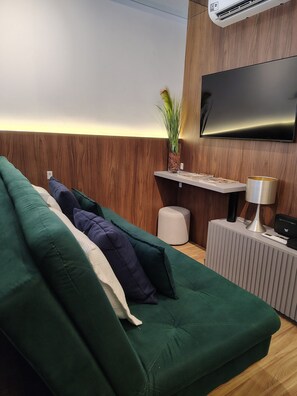 Apartment | Living area | Flat-screen TV - Skyline (Porto Alegre)