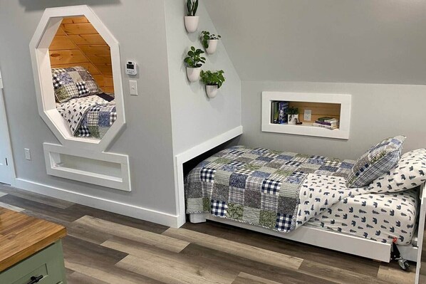 Iron/ironing board, travel crib, free WiFi, bed sheets