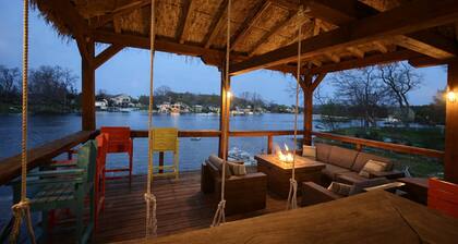 All-Sports Lakefront Retreat w/ Private Beach, Dock & Tiki Bar - Sleeps 10