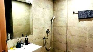 Shower, bidet, towels, soap