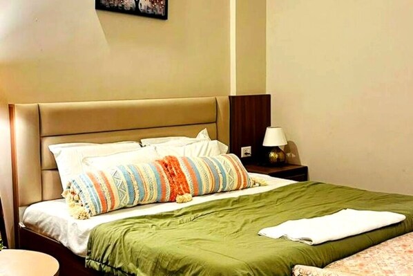 1 غرفة نوم ومكواة/لوح كي وواي فاي وملاءات أسرّة