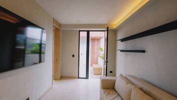 Penthouse de lujo, vista a la ciudad | Área de sala de estar