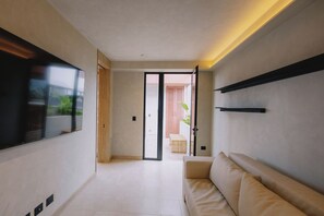 Penthouse de lujo, vista a la ciudad | Área de sala de estar