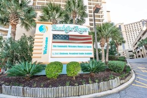 A sign for Beach Cove Resort welcoming owners and guests, indicating 1, 2, & 3 bedroom oceanfront condos available. - 1 BR at Beach Cove Resort,Pools, Direct Oceanfront (North Myrtle Beach)