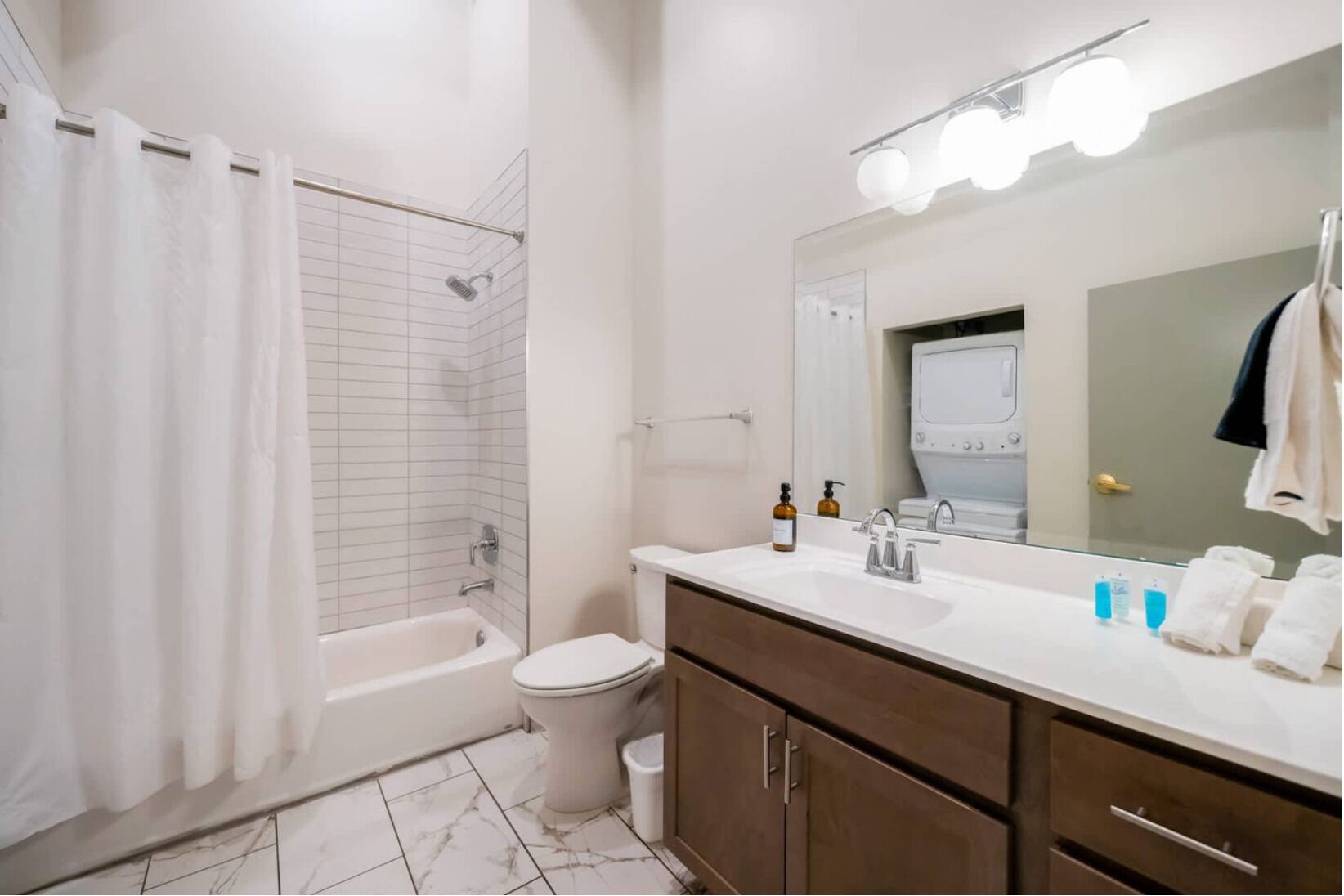 Hair dryer, towels, soap, shampoo