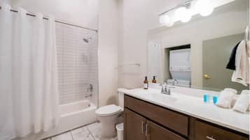 Hair dryer, towels, soap, shampoo