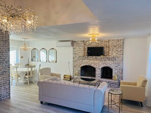 Smart TV, fireplace, table tennis, books