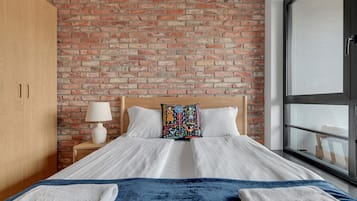 Apartemen Comfort, balkon | Setrika/meja setrika dan Wi-Fi gratis