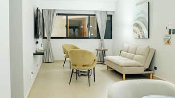 Family Suite | Living area | TV