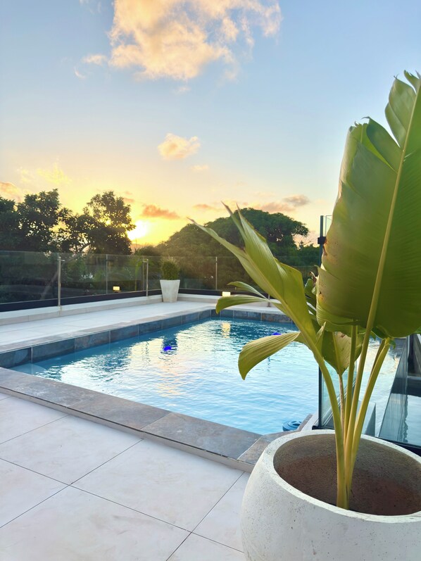 3 outdoor pools, open 8:00 AM to 10:30 AM, pool umbrellas, pool loungers