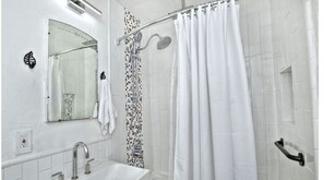 Jetted tub, hair dryer, towels, soap