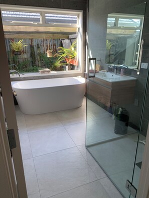 Shower, hair dryer, towels, soap