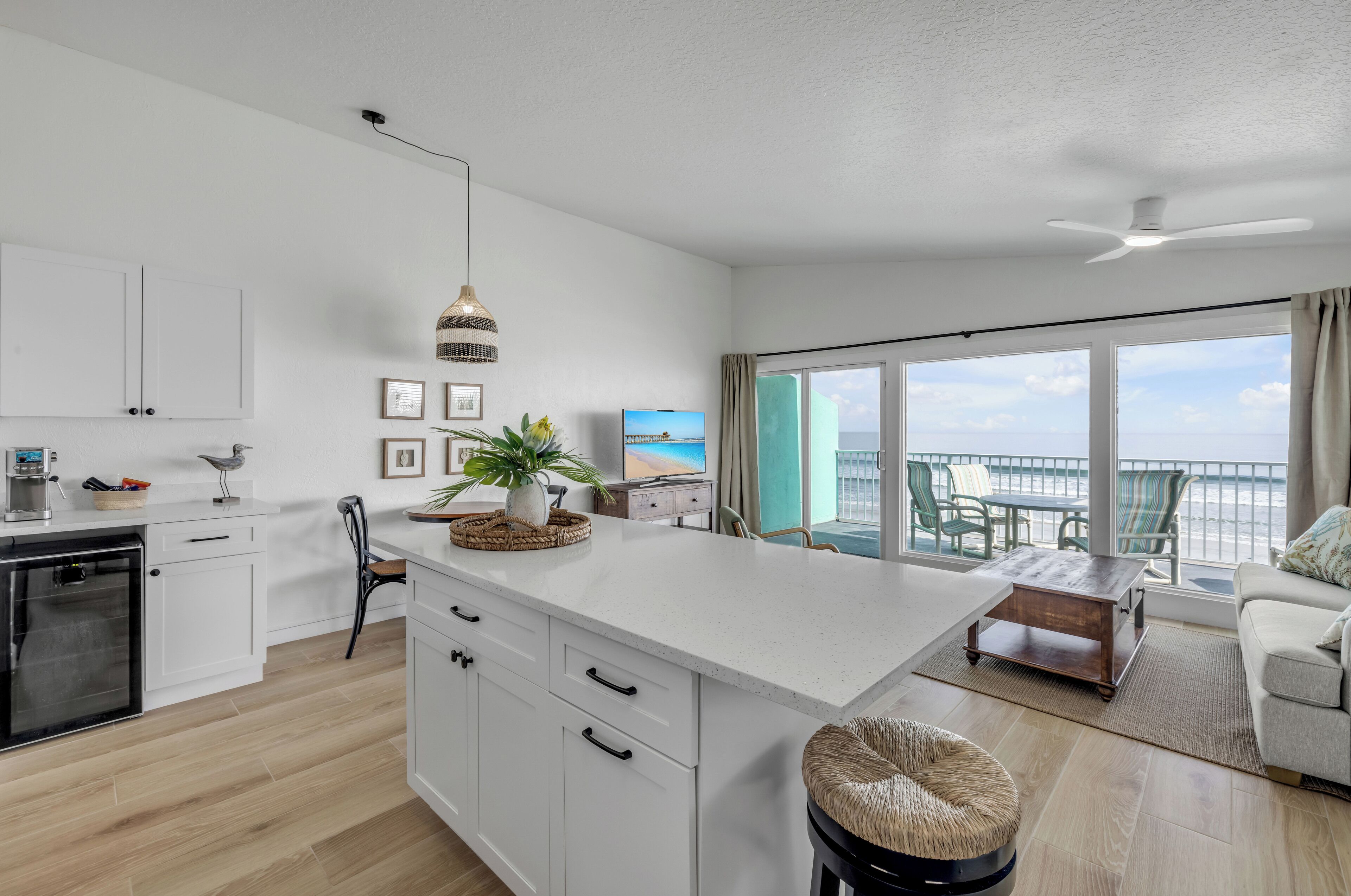 Deluxe Condo, Beach View | Living area | TV, DVD player